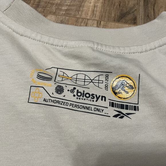 Reebok Jurassic World Stucco Tyrannosaurus Rex Fossil Brown Mens XL Shirt NEW - Picture 9 of 11